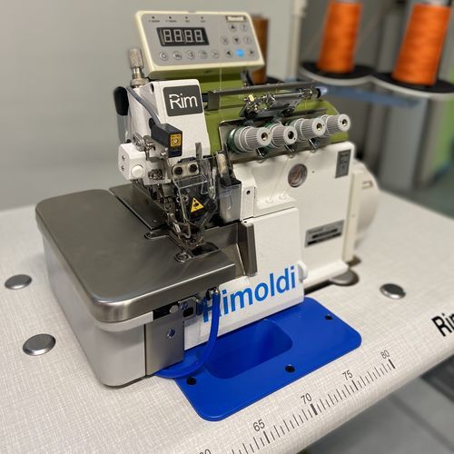 Máquina de coser automática - PL27-X026-F10 - RIMOLDI - punto de cantonera / de 2 agujas / de 3 hilos
