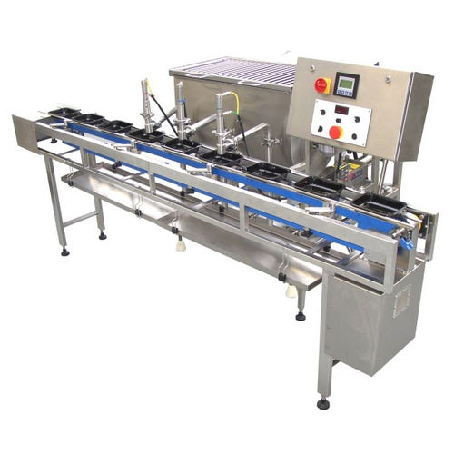 Línea de llenado automática - Riggs Auto Pack Ltd - de barquillas / para productos alimentarios / de líquidos