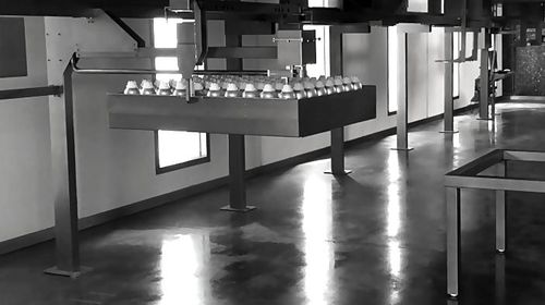 Llenadora automatizada - Roxane SAS - de botellas / IBC / de bidones