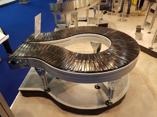 Transportador de banda - AmbaVeyor - AmbaFlex Spiral Conveyor Solutions - de rodillos / horizontal / curvo