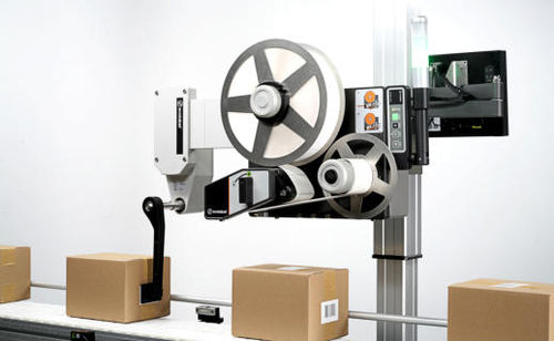 Máquina de etiquetado de cartón - Industrial Labelling Systems - para aplicación en el lateral del producto / para aplicación en la parte superior del producto / para etiquetas autoadhesivas