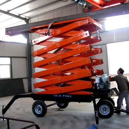 Plataforma elevadora de tijera con ruedas - a11004 - Jinan Juxin Machinery Co., Ltd. - para uso en interiores y exteriores / para obra / para aplicaciones industriales
