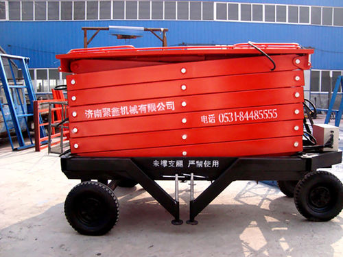 Plataforma elevadora de tijera con ruedas - a11001 - Jinan Juxin Machinery Co., Ltd. - para uso en interiores y exteriores / todoterreno / para aplicaciones industriales