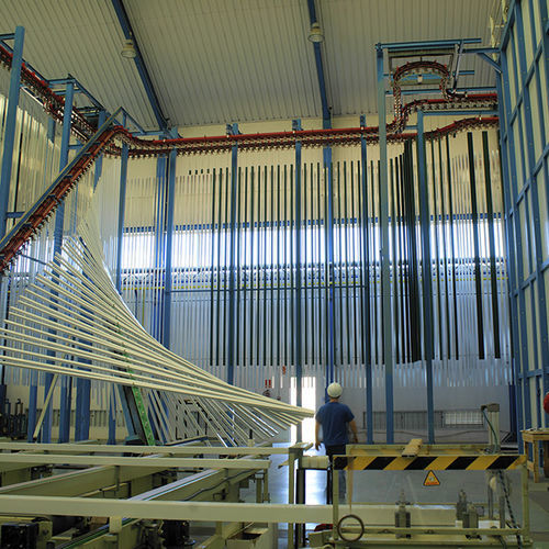 Línea de empolvado vertical - EXTRUSIONES DE TOLEDO S.A. - automática