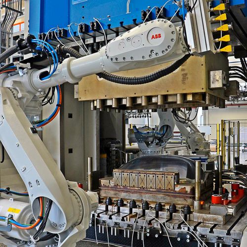 Sistema de carga y descarga para piezas - Schmidt & Heinzmann GmbH & Co KG - de vacío / automático