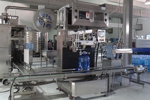 Etiquetadora automática - JND-100N - Shenzhen J&D Drinking Water equipment Co Ltd - para botellas / de botes / para manga termorretráctil