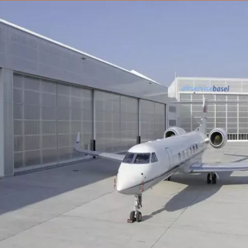 Puerta de hangar - Shanghai Kenvo Door Co., Ltd - corredera / de acero / de acero galvanizado