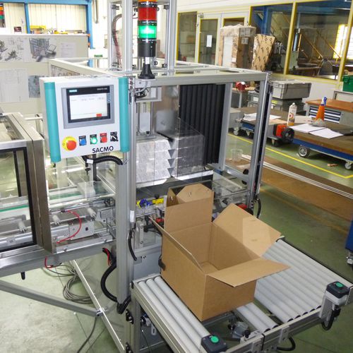 Encajadora lateral - SACMO - semiautomática / de paquetes / de cartón