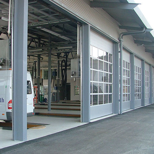 Puerta seccional - iCat® - Rsa kapi LTD - de metal / de aluminio / para exteriores