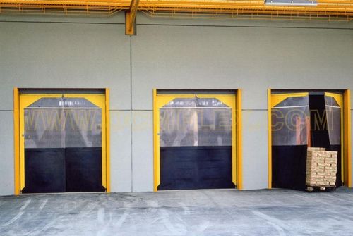 Puerta abatible - OCM Industrial Doors - de caucho / de PVC / industrial