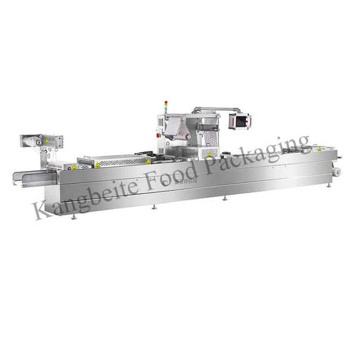 Máquina de termoformado alimentada por rodillo - DRZ series - Shandong Kangbeite Food Packaging Machinery Co., Ltd. - para embalajes de productos alimentarios / automática / de vacío
