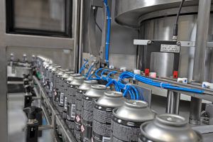 Llenadora tapadora automática - R and R Aerosol Systems - para líquido / rotativa / de alta velocidad