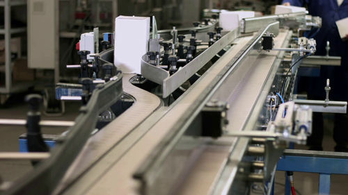 Paletizador para cajas de cartón - Sinterpack - robotizado / para cajas / automático