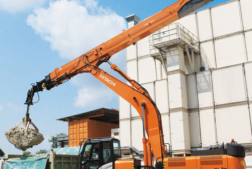 Excavadora de brazo telescópico - ZX330LC-5G CTA - Hitachi Construction Machinery Europe - de grandes dimensiones / con orugas / para obra de construcción