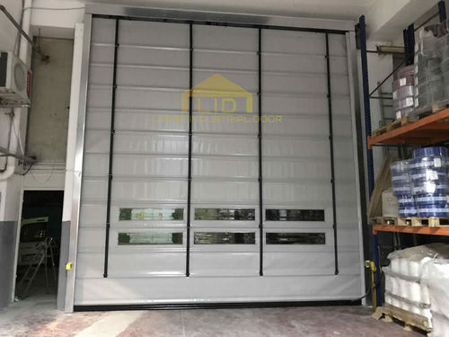 Puerta plegable - Large Industrial Door Co., LTD - de PVC / de tejido / de metal