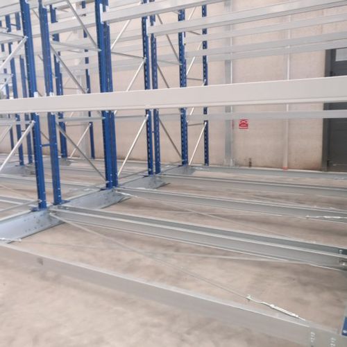 Sistema de estanterías para depósito de almacenamiento - Mobilfer S.R.L. - con tablas / móvil / para carga mediana