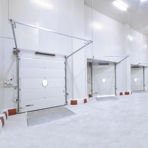 Puerta corredizas - KOPRON SPA - seccional / industrial / de hangar