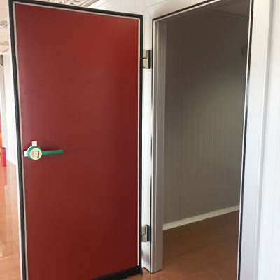 Puerta abatible - Kavidoors - con bisagra / para interior / industrial