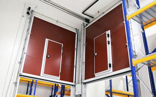 Puerta corredera vertical - Kavidoors - de acero inoxidable / de aluminio anodizado / para interior