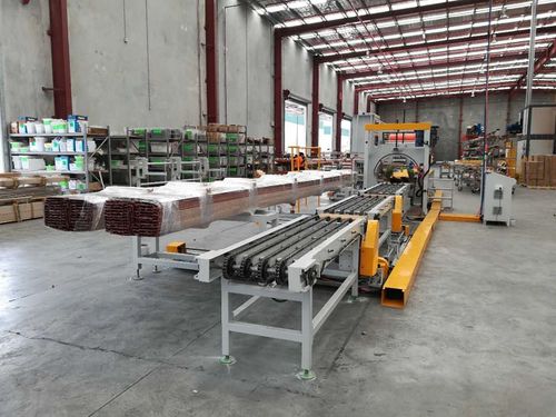 Envolvedora horizontal - Shanghai Fhope machinery co.,ltd - enteramente automática / para perfiles de aluminio / con transportador