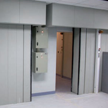Puerta corredera - DIB PRODUCTION - de acero / de plomo / para interior