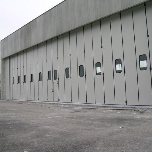 Puerta industrial - Moreschi Chiusure Industriali S.r.l. - plegable / de acero galvanizado / clase 4