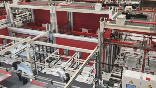 Paletizador cremallera - NSM MAGNETTECHNIK GmbH - con con máquina apiladora / de manipulación / para transporte