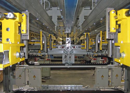 Línea de apilado de piezas troqueladas - NSM MAGNETTECHNIK GmbH - de cinta transportadora / para aplicaciones automovilísticas