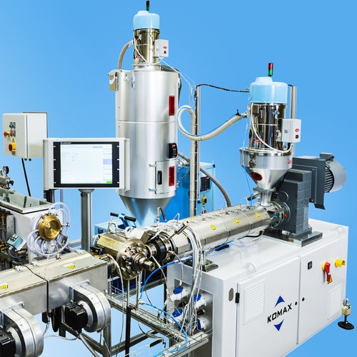 Línea de extrusión multicapas - KOMAX - refrigerada con agua / monoestrato / con unidad de impresión en línea