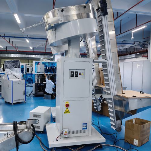 Sistema de alimentación automático - Shenzhen xinzhong plastic - neumático / para línea de producción / para máquinas de embalaje