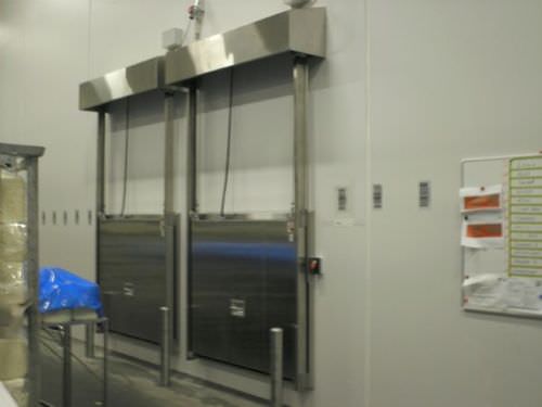 Puerta corredera vertical - MV0601K - DAN-doors - de metal / para cámara frigorífica / industrial