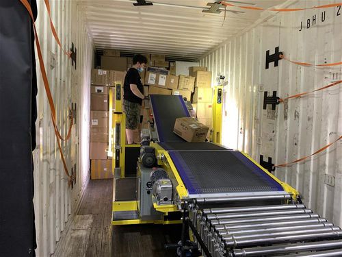 Transportador de banda - Restuff-it™ - Gorbel - de carga / de descarga / modular
