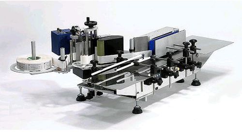 Etiquetadora semiautomática - JDA-1 - JDA PROGRESS IND. - para botellas / de latas / wraparound