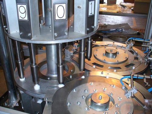 Encapsuladora rotativa - Productive Systems - automática / multicontenedor