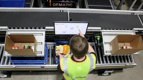 Máquina de preparación de pedidos múltiples - DEMATIC - pick-by-voice / Put Wall / automática