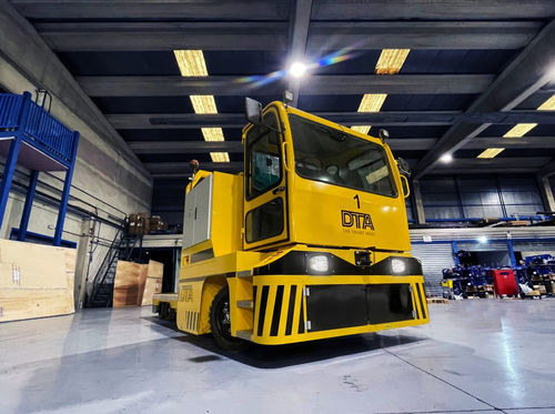 Transportador autopropulsado eléctrico - DTA - alimentado por batería / para grandes cargas / elevador