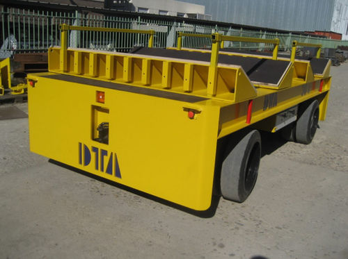 Transportador autopropulsado eléctrico - DTA - para grandes cargas / elevador / multidireccional