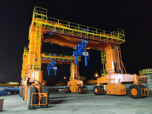 Carretilla elevadora de tipo straddle (horcaja) para vigas prefabricadas de hormigón - MST 230 - CIMOLAI TECHNOLOGY - ajustable en altura / con neumáticos