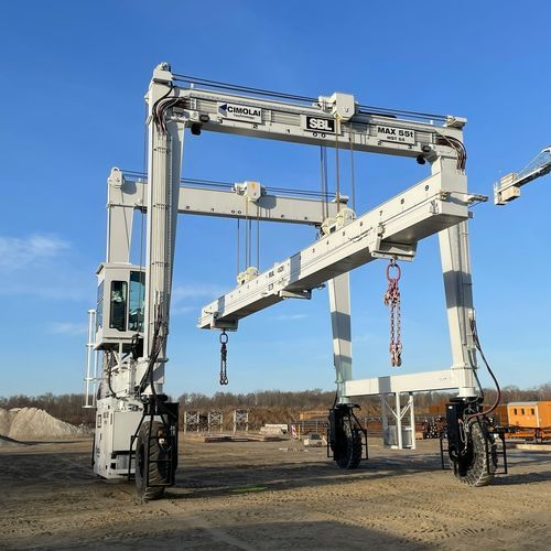 Carretilla elevadora de tipo straddle (horcaja) para vigas prefabricadas de hormigón - MST 55 - CIMOLAI TECHNOLOGY - para cargas pesadas / con neumáticos