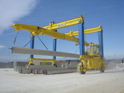 Carretilla elevadora de tipo straddle (horcaja) para vigas prefabricadas de hormigón - MST 65 - CIMOLAI TECHNOLOGY - con neumáticos