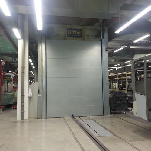 Puerta a prueba de calor - Jansen Tore GmbH & Co.KG - seccional / de metal / industrial