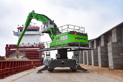 Manipuladora de materiales con neumáticos - 870 E Hy­brid series - SENNEBOGEN Maschinenfabrik GmbH - hidráulica / eléctrica / híbrida
