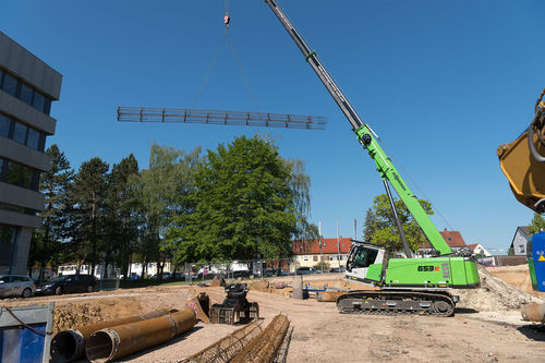 Grúa telescópica - 653 E - SENNEBOGEN Maschinenfabrik GmbH - con orugas / de mástil / para obra
