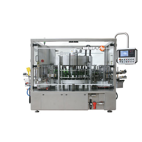 Máquina de etiquetado automática - TORNADO W - HEUFT SYSTEMTECHNIK - para botellas / para la industria de las bebidas / de cola hot-melt