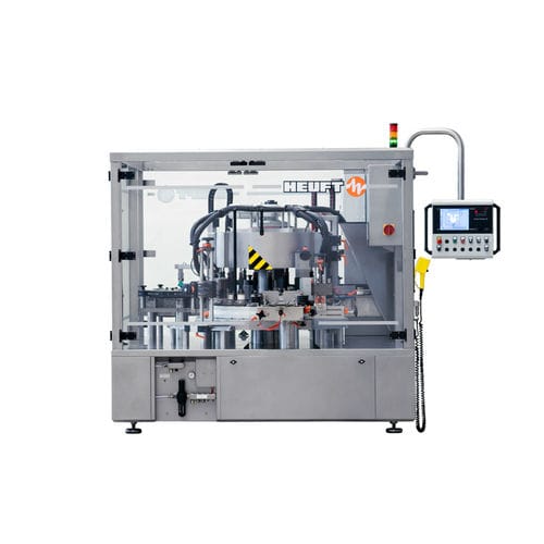 Máquina de etiquetado automática - TORNADO R - HEUFT SYSTEMTECHNIK - para botellas / wraparound / para la industria de las bebidas