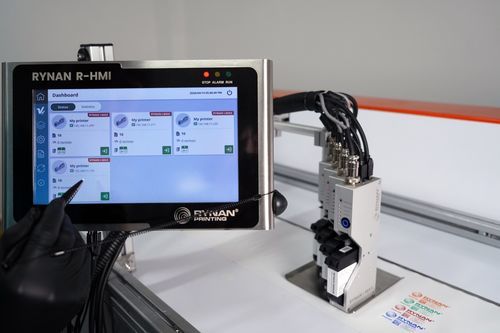 Aparato de marcado y codificación por chorro de tinta térmica - i-TIJ - RYNAN Technologies Pte Ltd - de cajas de cartón / para línea de producción continua / para etiquetas