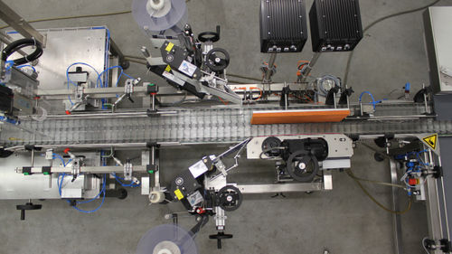 Máquina de etiquetado automática - VOLLENDA-WERK GmbH - para botellas / para aplicación en el lateral del producto / de doble cara