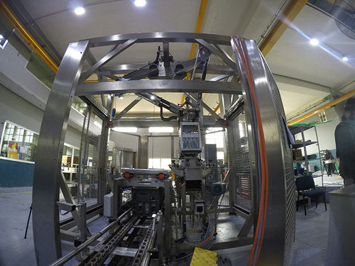 Encajadora robotizada - Technica International - automática / para botellas / de vasos