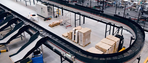 Sistema de clasificación con cinta transversal - SpeedSorter® loop - GEBHARDT Intralogistics Group - automático / para línea de producción / continuo