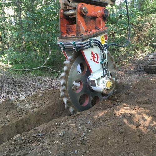 Sierra con cinta de diamante - Antraquip - para hormigón / montada en una excavadora